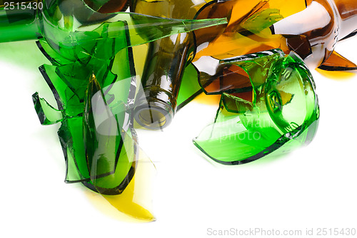 Image of Waste glass.Recycled.Shattered green and brown bottle 