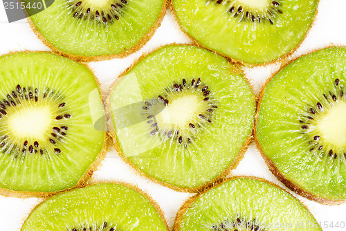 Image of kiwi fruit sliced on a white background 