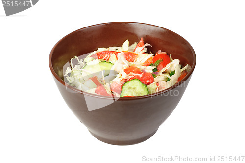 Image of fresh salad with tomato, cabbage and cucumber on bowl isolated on white 