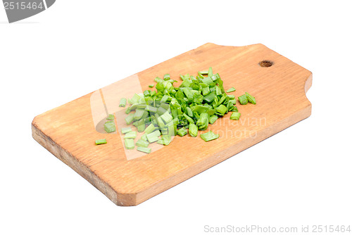 Image of fresh sliced onions on cutting board isolated on white 