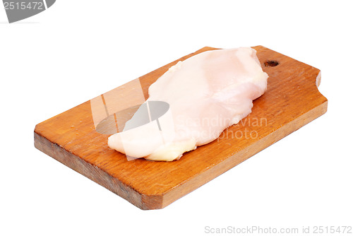 Image of chicken meat sliced   on  cutting  board isolated  on  white  background