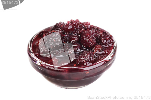 Image of mulberry and currants fruits jam in glass isolated on white macro 