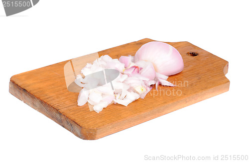 Image of sliced  onions on cutting board isolated on white 