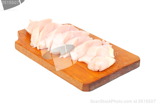 Image of chicken meat sliced   on  cutting  board isolated  on  white  background