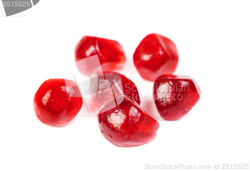 Image of Some garnet seeds isolated on white background 