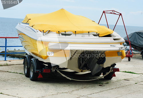 Image of Boat on a trailer  on the  sea and  sky  background
