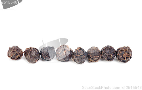 Image of black pepper macro as isolation on white background 