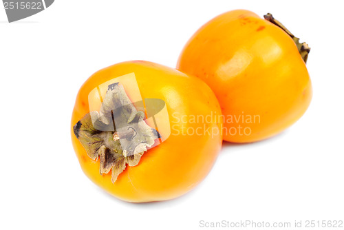 Image of Persimmon fruit slice on white background