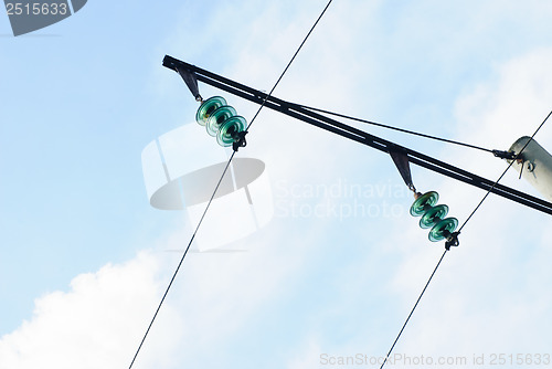 Image of part of high-voltage substation on the blue sky background 