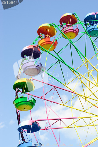 Image of Ferris wheel on the blue sky background 