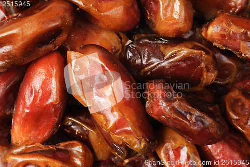 Image of Fine dried date fruits macro background 