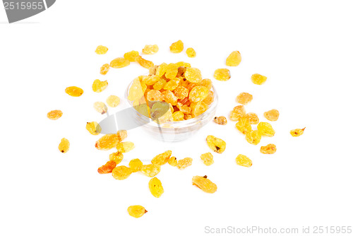 Image of Golden raisins close- up in glass bowl isolated on white background 