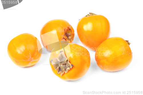 Image of Some persimmon fruit slice on white background 