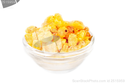 Image of Golden raisins close- up in glass bowl isolated  on  white background