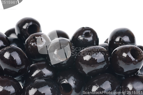 Image of Black pitted olives isolated on white 