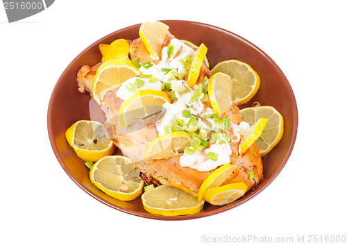Image of Grilled chicken breasts on a plate, isolated   on white