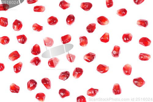 Image of garnet seeds isolated on white background 