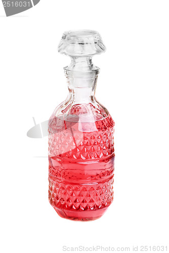 Image of Red wine on a decanter isolated over white background 