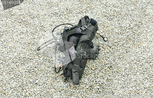 Image of Diving equipment on the grey pebble