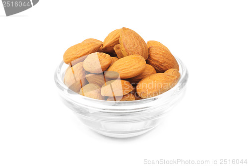 Image of Dried almonds on glass bowl isolated on a white background 