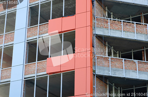 Image of Office building construction site. Thermal insulation of walls