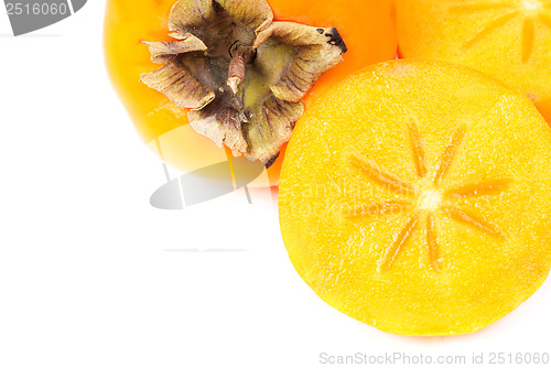 Image of Some persimmon fruit slice on white background 