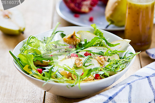 Image of Pear with Pommegranate and Rocket salad