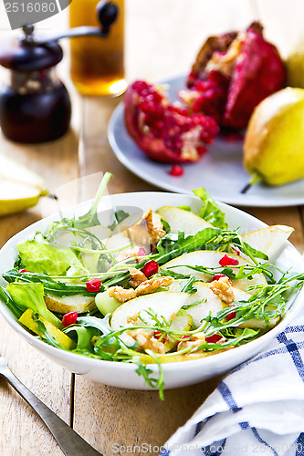 Image of Pear with Pommegranate and Rocket salad