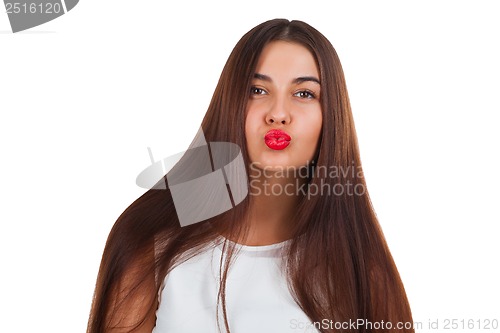 Image of Beautiful young woman kiss. Red lips