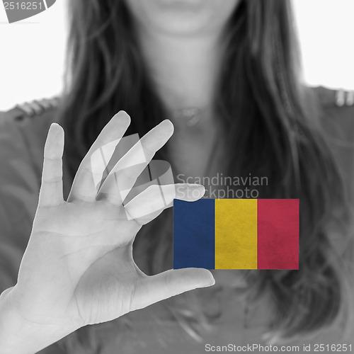 Image of Woman showing a business card