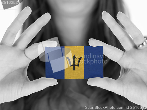 Image of Woman showing a business card