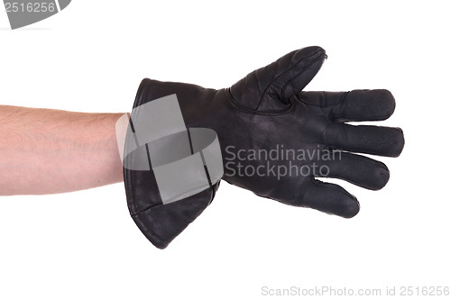 Image of Mans hand in very old black leather glove