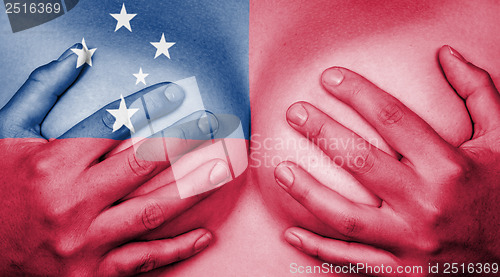 Image of Hands covering breasts
