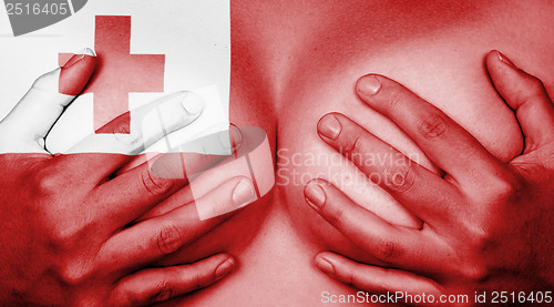 Image of Hands covering breasts