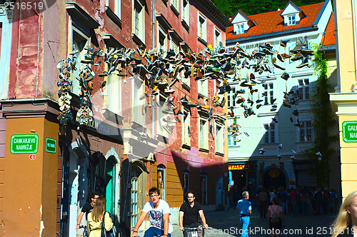 Image of Shoes hanging in the Old Town of Ljubljana