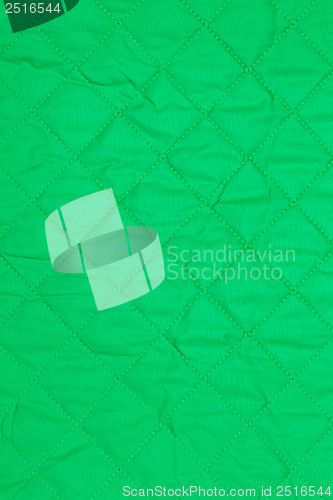 Image of green quilted fabric