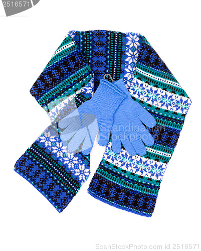 Image of patterned scarf and blue gloves