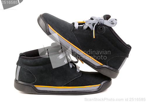 Image of black suede shoes