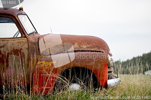 Image of vintage car abandoned