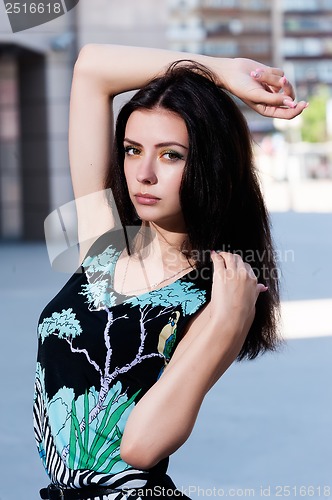 Image of beautiful young girl in dress