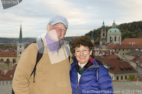 Image of middle age senior smiling man woman tourist couple Castle Distri