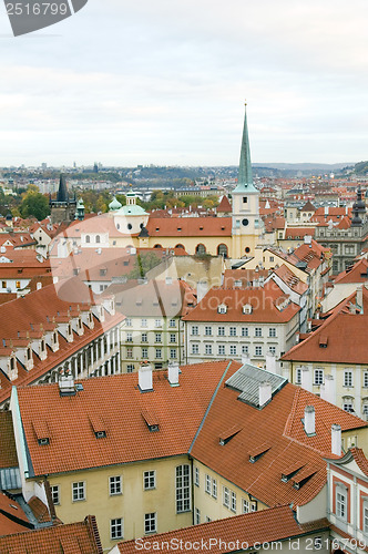 Image of rooftops of Prague, Czech Republic over Vltava River  Castle sid