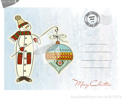 Image of snowman with big Christmas ball
