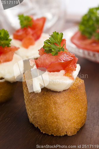 Image of Bruschetta with mozarella and tomatoes