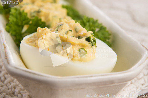 Image of Stuffed eggs with parsley and mayonnaise 