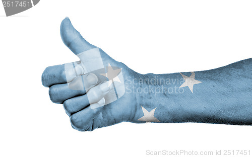 Image of Old woman giving the thumbs up sign