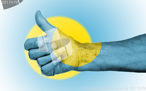 Image of Old woman giving the thumbs up sign