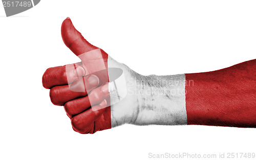 Image of Old woman giving the thumbs up sign
