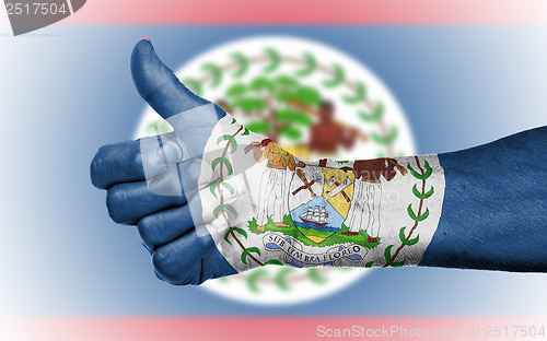 Image of Old woman giving the thumbs up sign