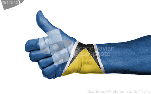 Image of Old woman giving the thumbs up sign